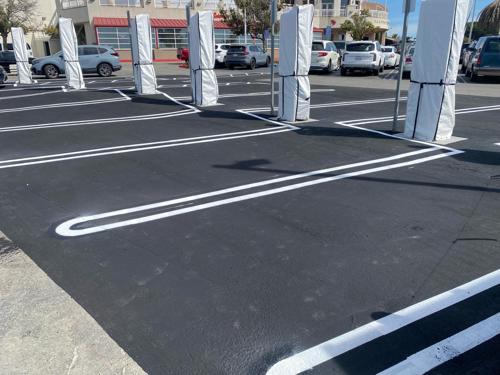 picture of freshly installed asphalt in a commercial property by west coast asphalt